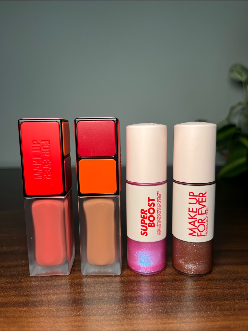 Set of 4 Make Up For Ever products. Artist liquid Color + Super Boost lipgloss
